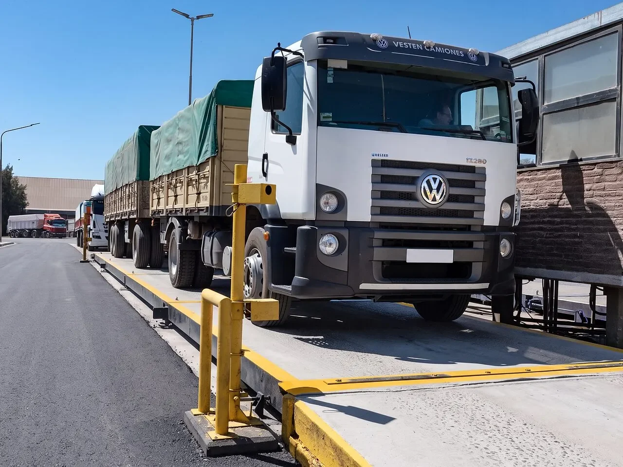 Truck on the port scale, with the weight display in the foreground.